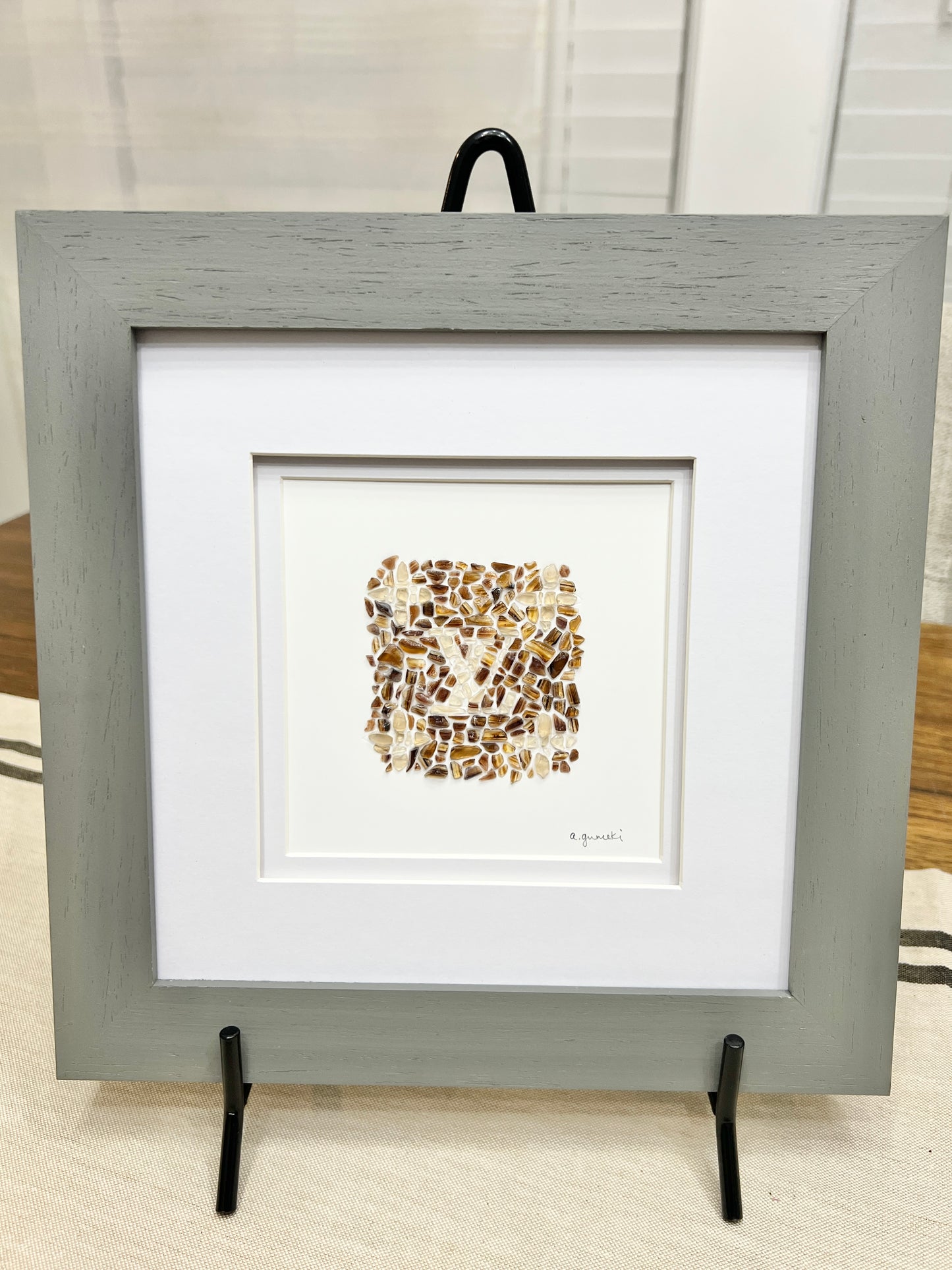 Embossed Louis Vuitton Logo